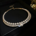 Women's silver geometric round collarbone necklace on a clavicle chain.