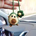 Handmade crocheted rainbow flower car pendant in wool yarn with avocado, pink, and red colour options