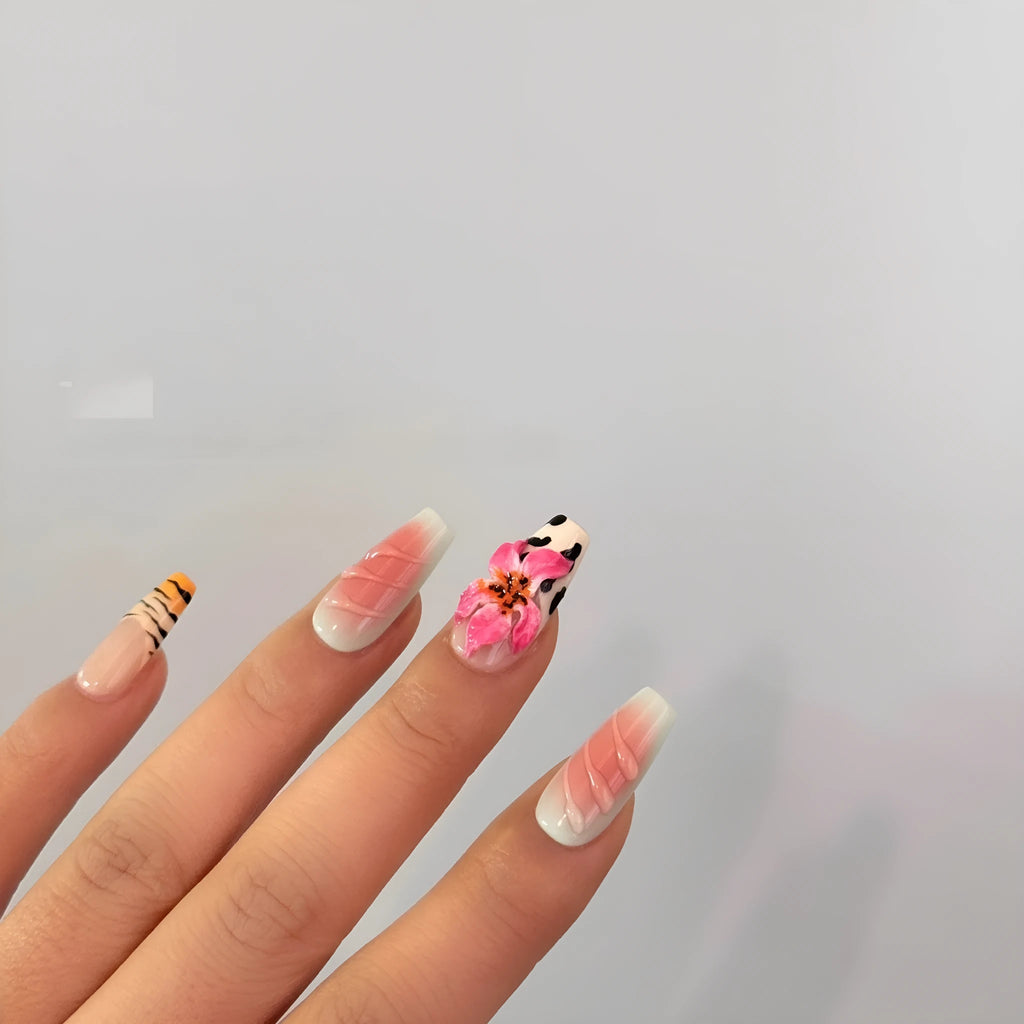 Zebra pattern hand carving nail art with embossed flower and leopard print designs in four sizes