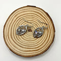Silver colour women's earrings with creative leaves design embedding colourful moonstones