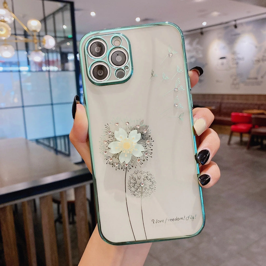 Green silicone iPhone case with a 3D spinning pink flower decoration on the back.