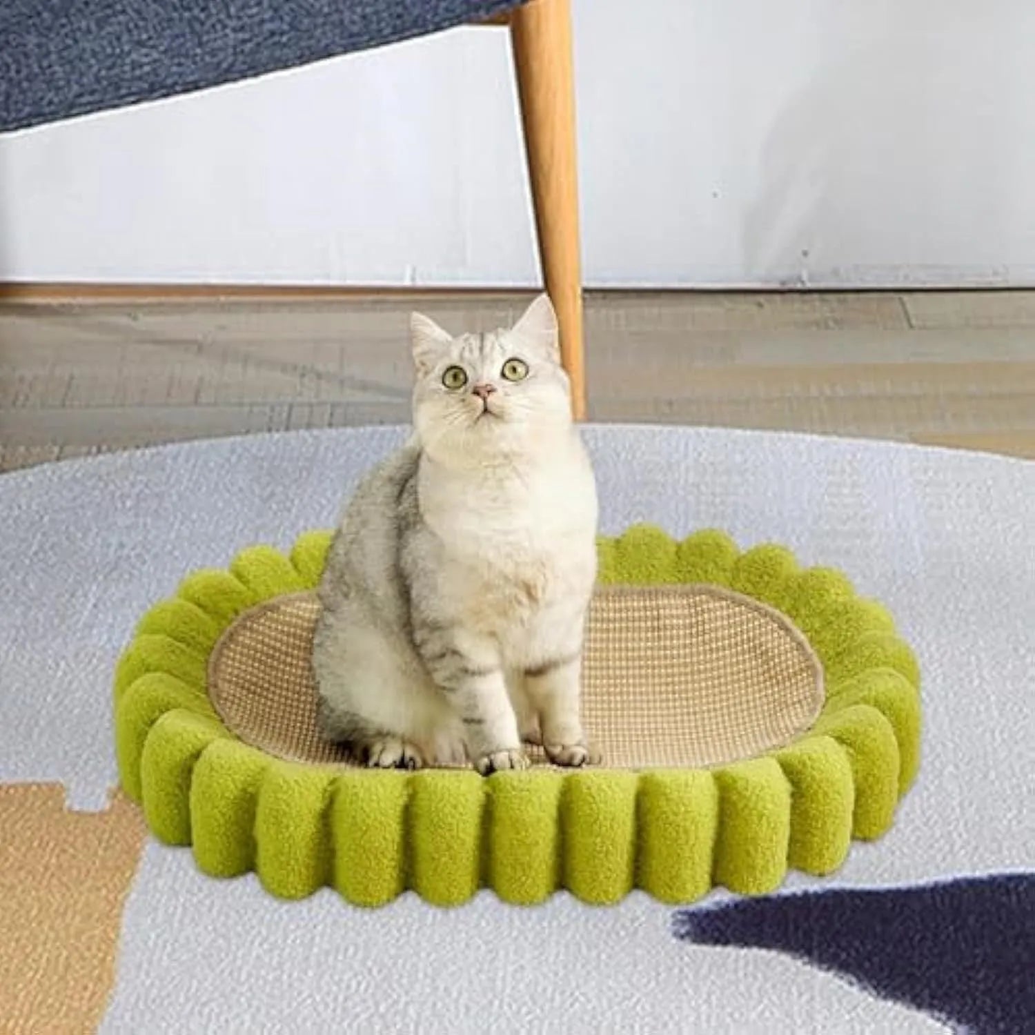 Green oval-shaped sisal cat scratching pad and lounger bed