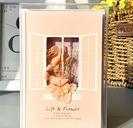 Handmade 3D boxed greeting card with butterfly shape, hot stamping, and artificial flowers on coated paper.