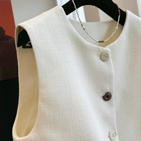 Women's French style bandage vest dress in milky white with round neck and sleeveless design