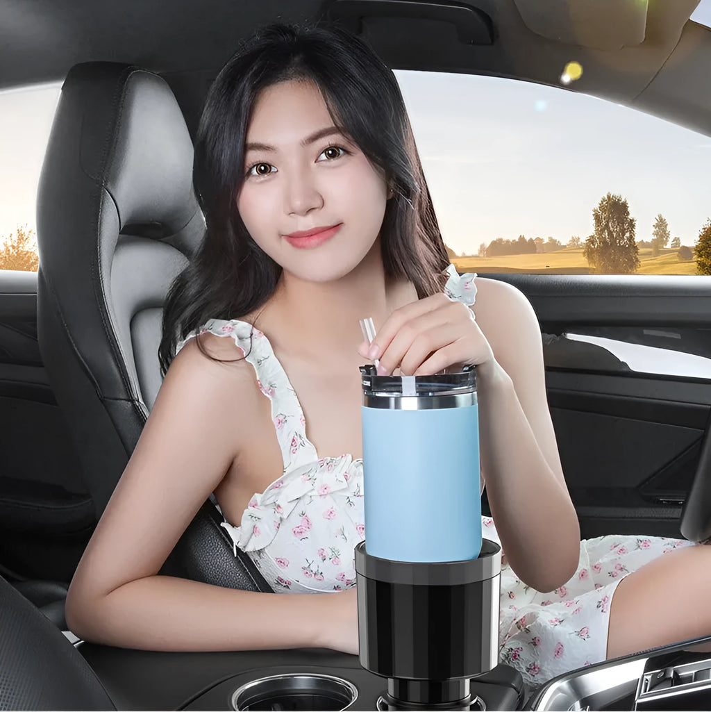 Matte black ABS car cup holder expander with adjustable base for large drink bottles.