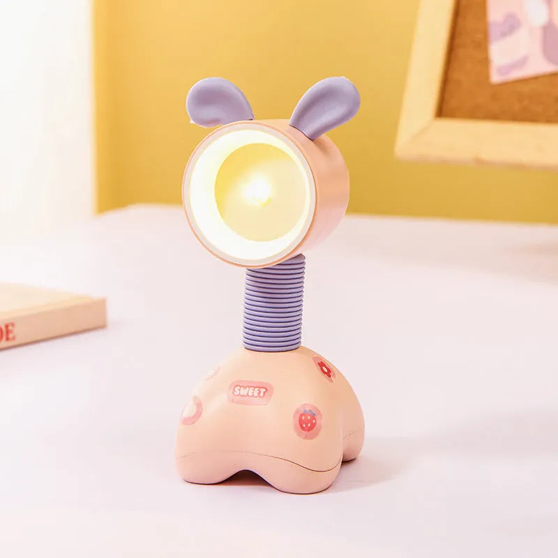 DIY cartoon magnetic small night lamp in assorted animal styles and colours on a desktop.