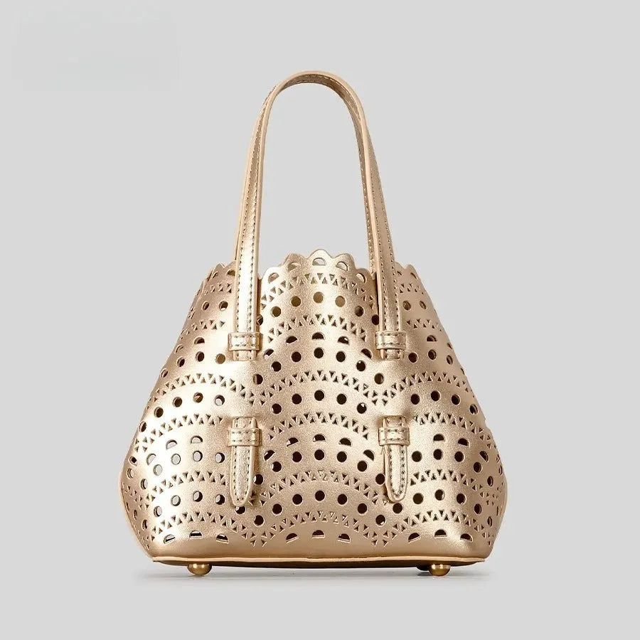 Hollow carved PU leather messenger bag in horizontal square shape with three shoulder straps