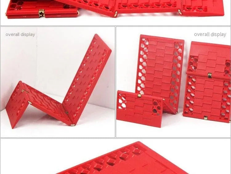 Orange folding rescue boards for vehicle recovery in mud and snow conditions