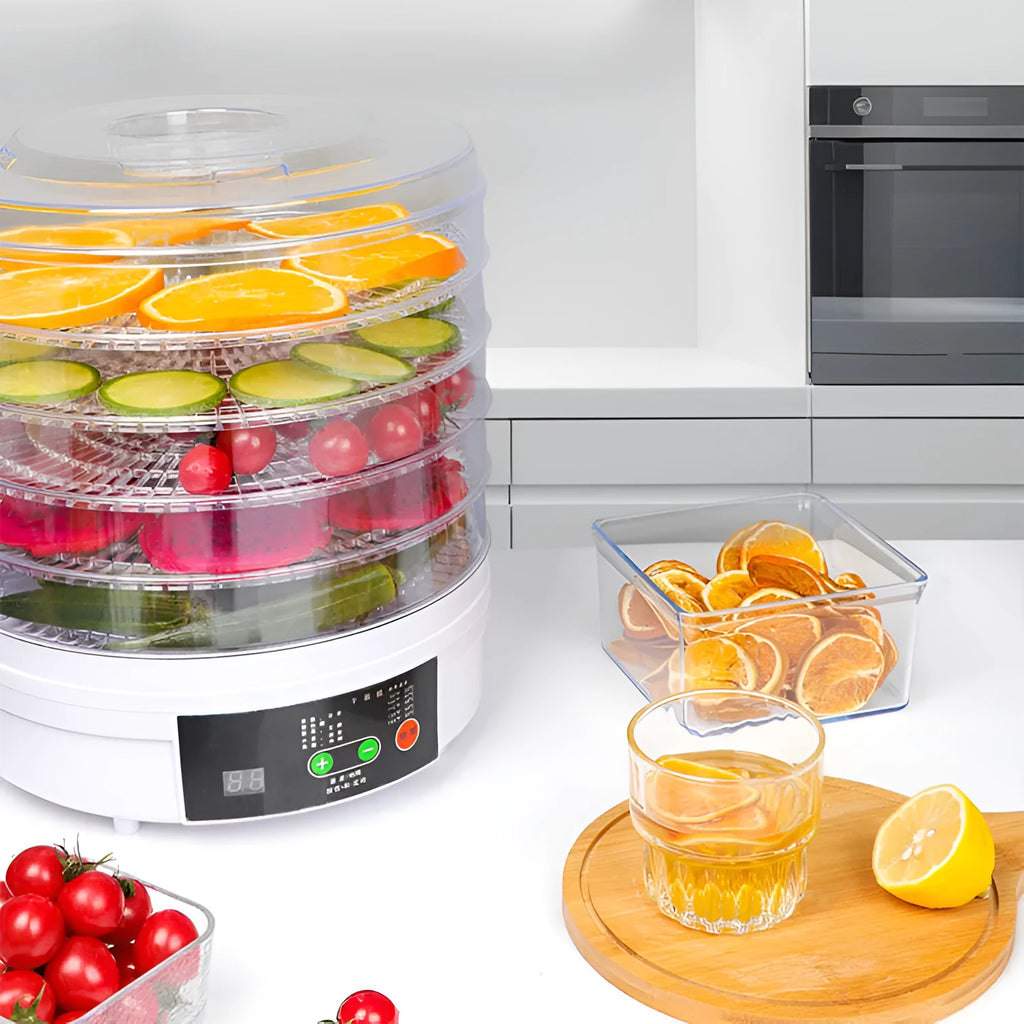Household food dehydrator appliance with multiple stacked drying shelves on a countertop