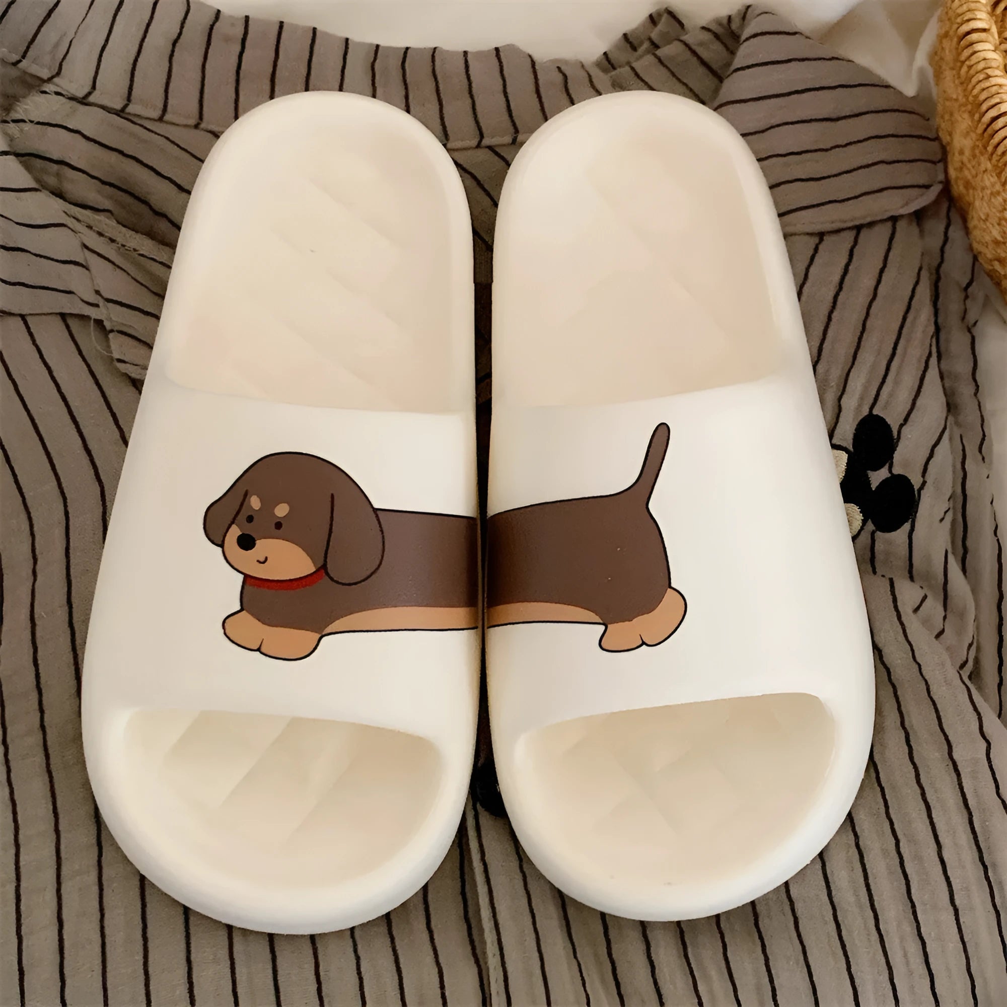 EVA couple household slippers in three colours with dog stitching print and thickening flip-flop sole.