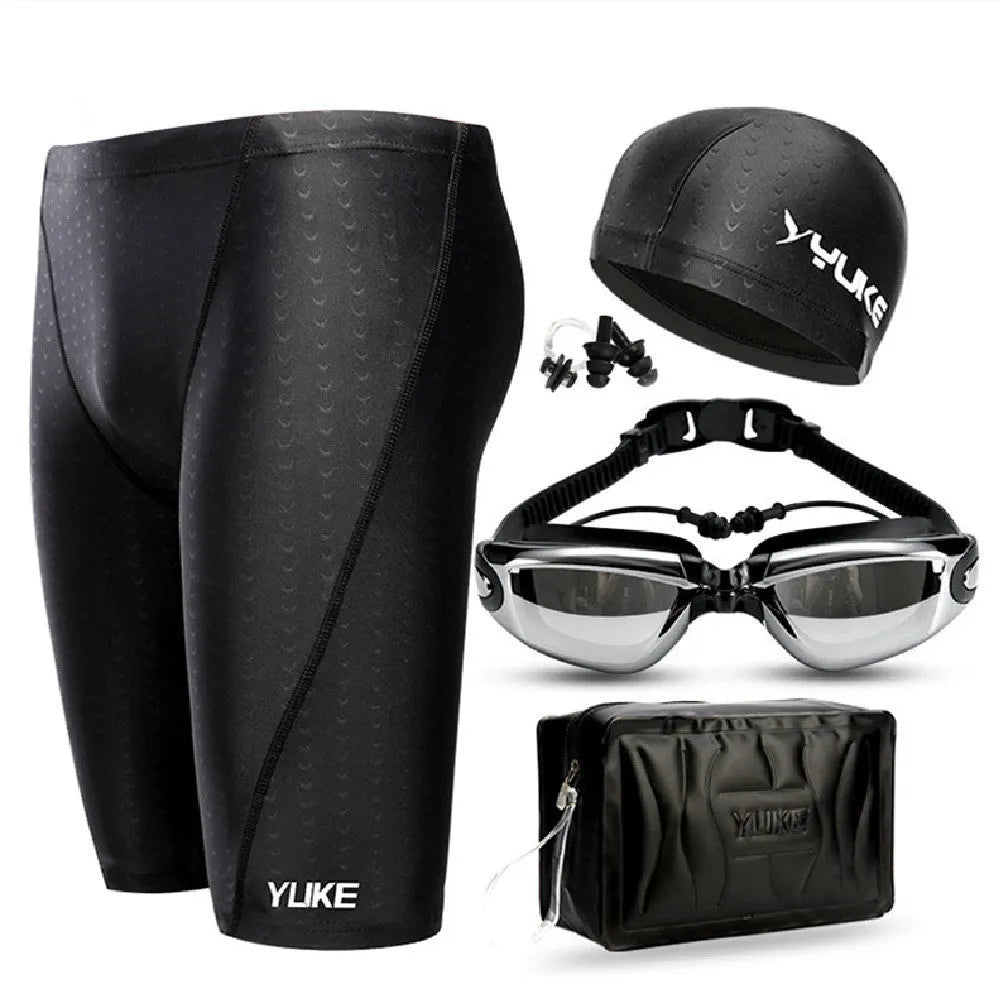 Men's black five-piece swimming set showing trunks, goggles, cap, ear plugs, nose clip, and storage bag