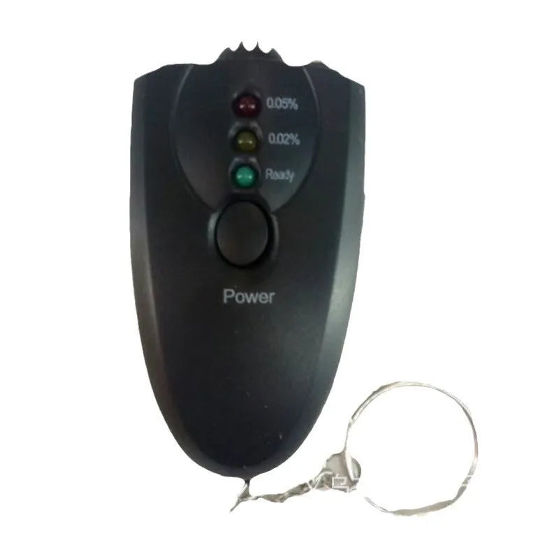 Black portable breath alcohol tester with LED display, torch flashlight, and keychain attachment on a white background