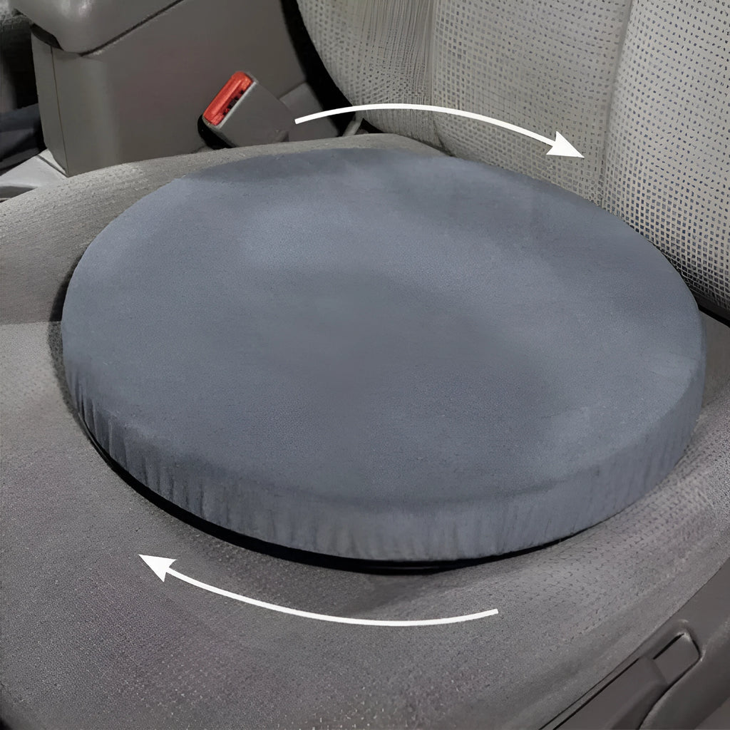 Circular grey rotating car seat cushion for elderly passengers on a car seat