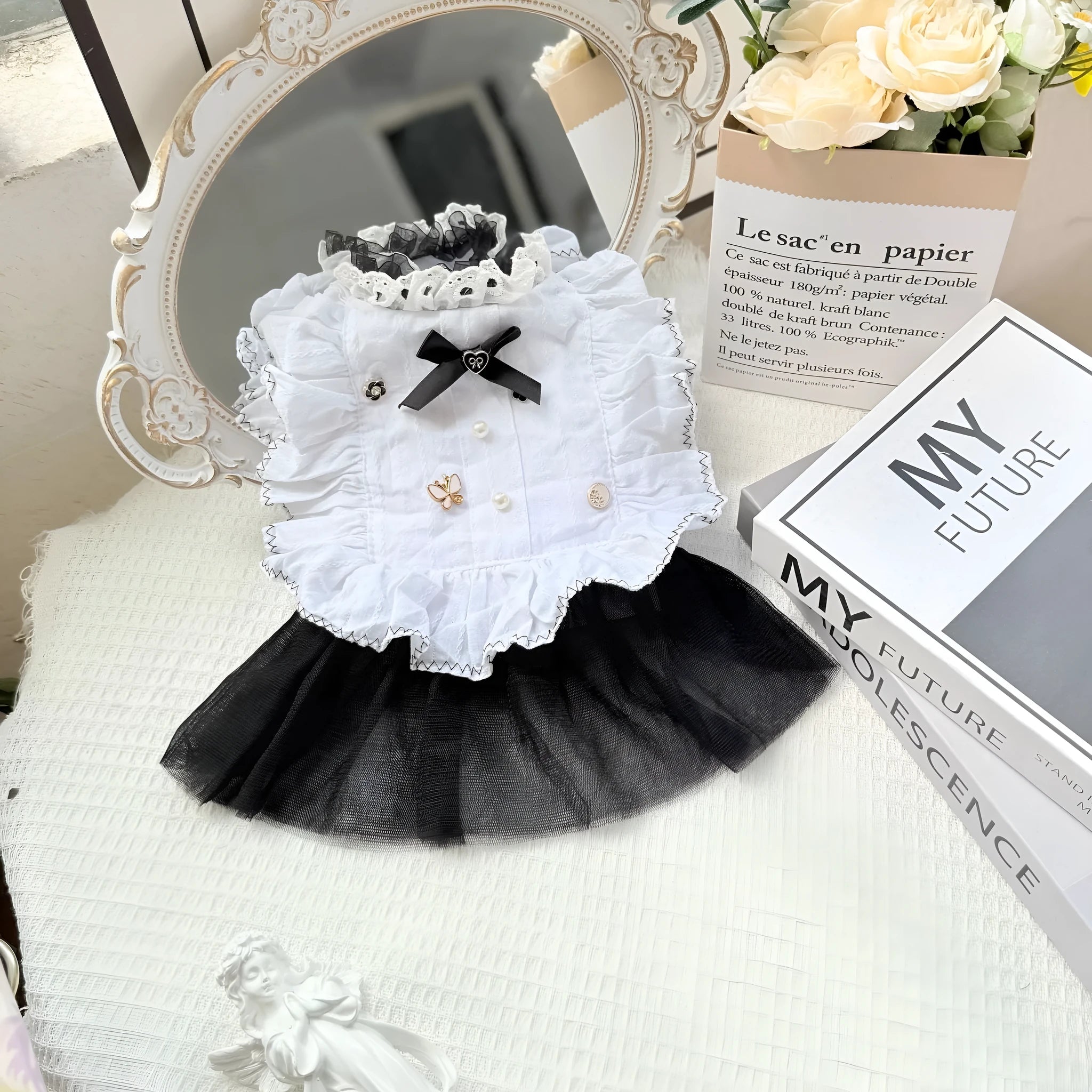 White yarn princess-style Waltz gauze skirt costume on a small dog, showing tiered design.