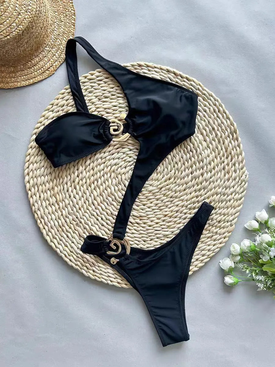 Women's black printed nylon bikini swimsuit set on model