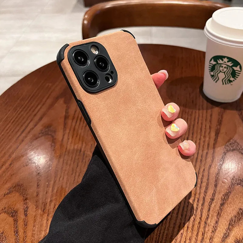 Simple solid colour fur phone case with imitation leather texture for iPhone fall prevention, available in black, blue, and green