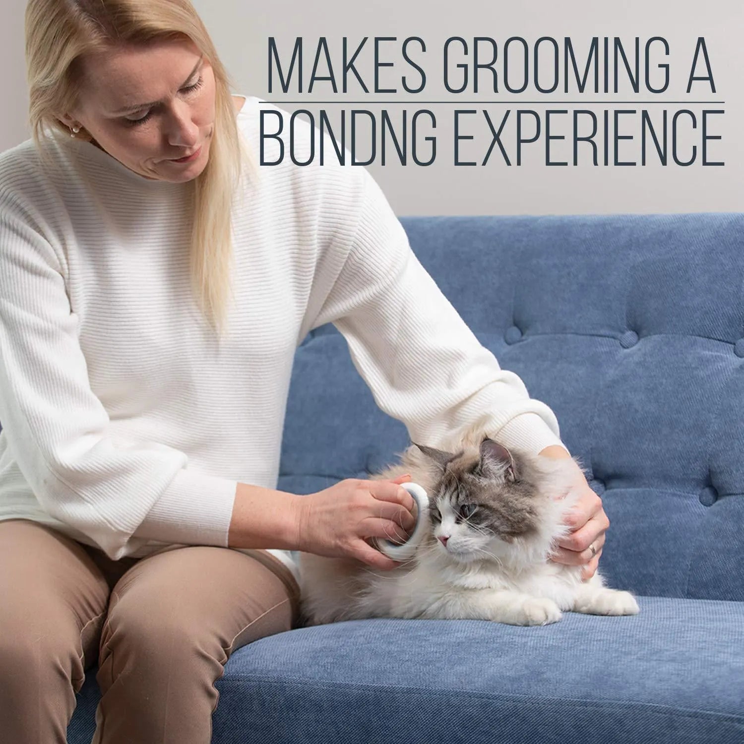 Blue pet grooming comb for cats and dogs on a white background, showing ergonomic handle and soft teeth.