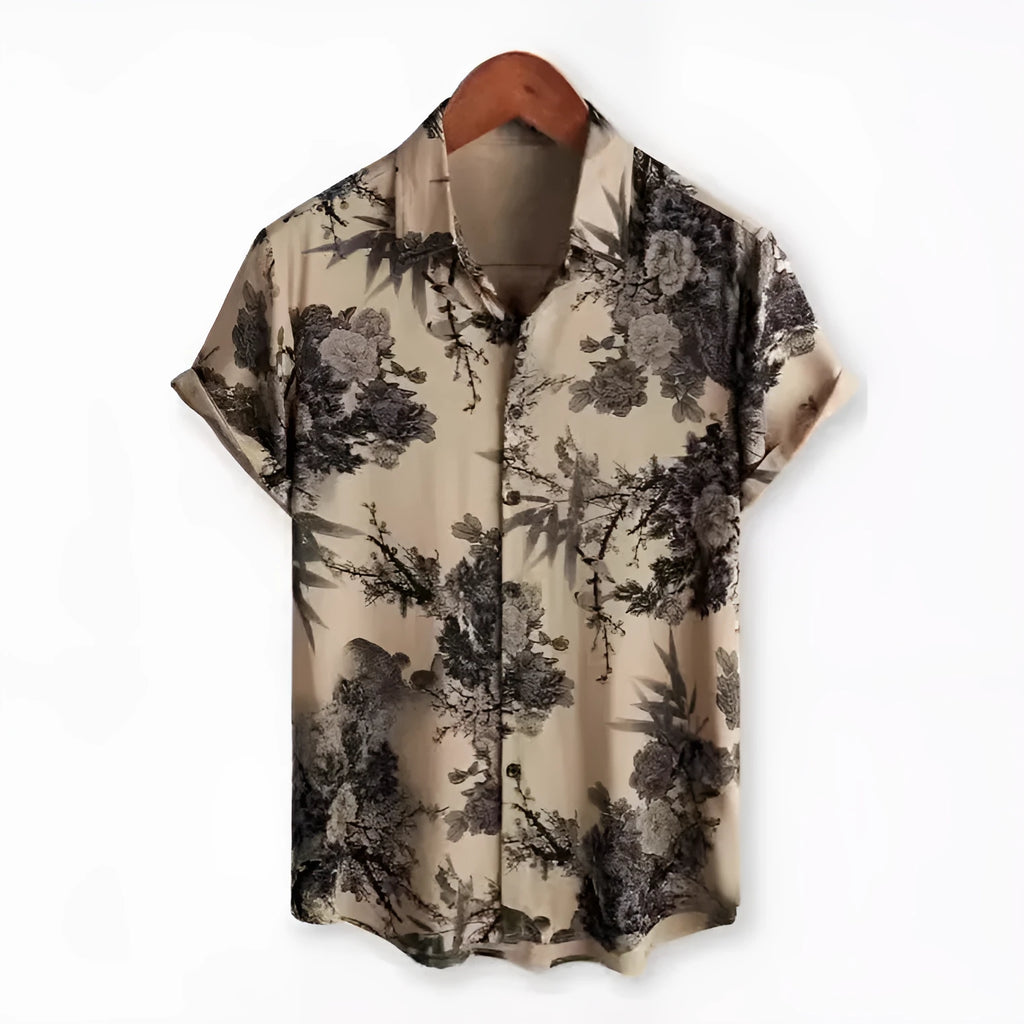 Man wearing a short sleeve Hawaiian print shirt with floral pattern and elastic fabric.