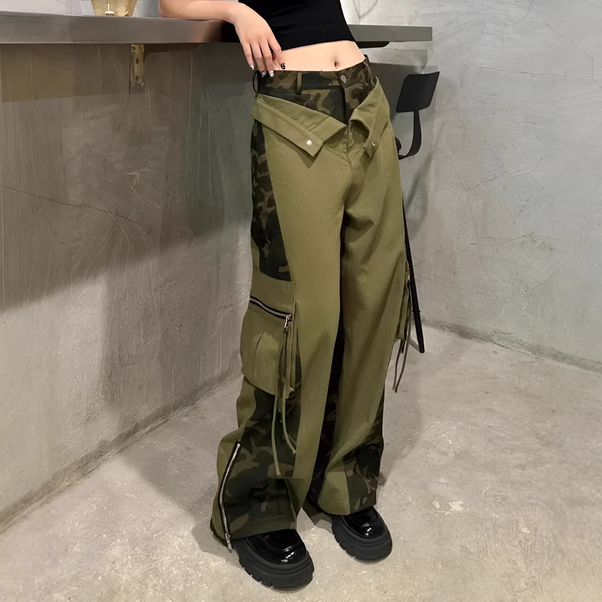Dark khaki leopard print high-waist jeans with contrast stitching and straight leg.