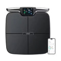 Black eight-electrode body fat smart scale showing digital display on 45cm platform