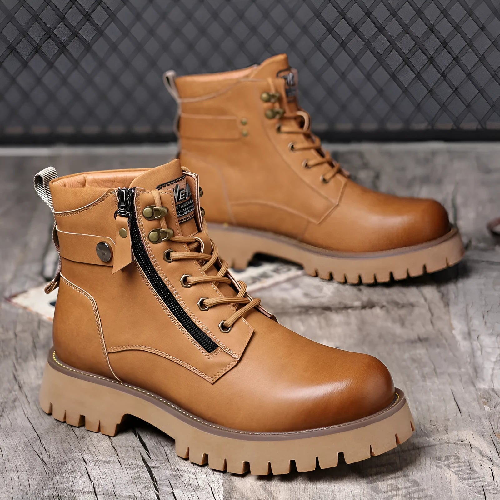 Men's brown leather high-top boots with a side zipper and round toe.