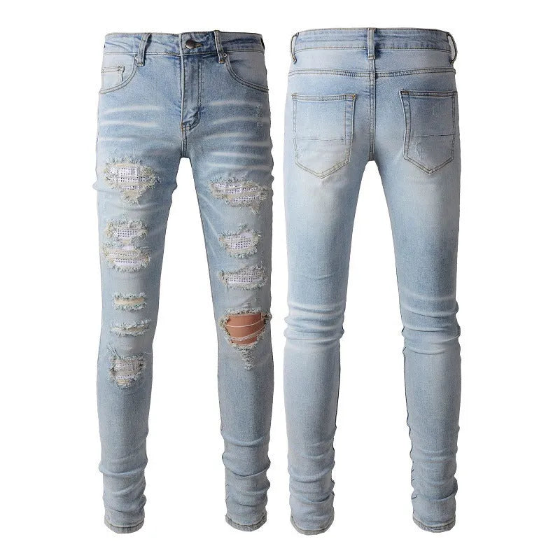 Light blue men's elastic slim fit jeans with hot diamond patch and whisker scrape detailing