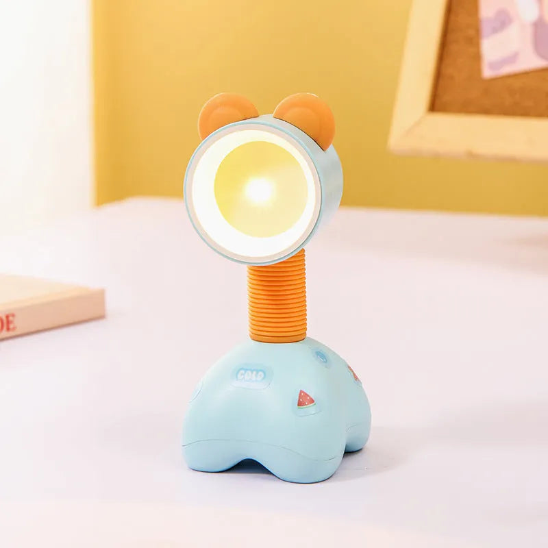 DIY cartoon magnetic small night lamp in assorted animal styles and colours on a desktop.