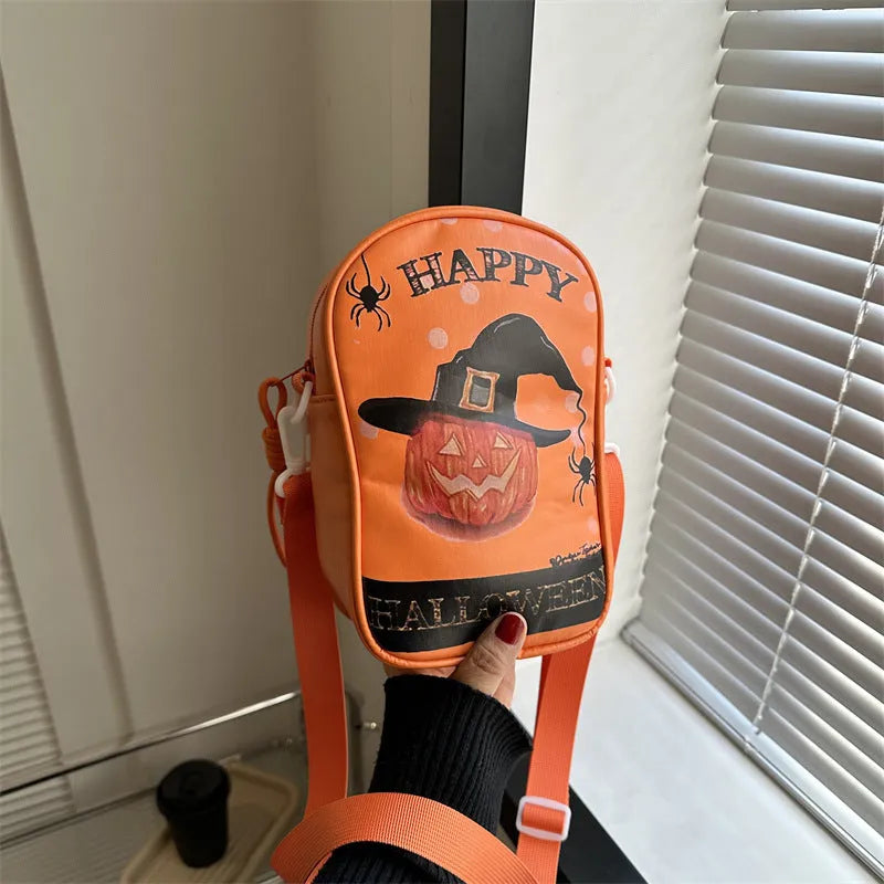 Halloween graffiti print crossbody bag with cartoon pumpkin ghost bat design in orange colour