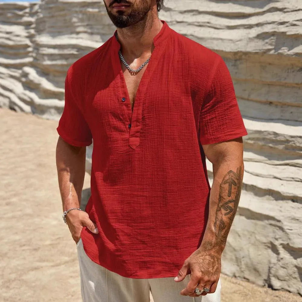 Men's solid colour short-sleeve shirt with a stand collar on a hanger.