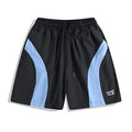 Men's black quick-drying training shorts with elastic waistband and above-knee length