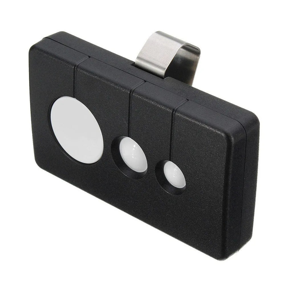 Black plastic three-button LiftMaster garage door remote control with green key, showing front view.