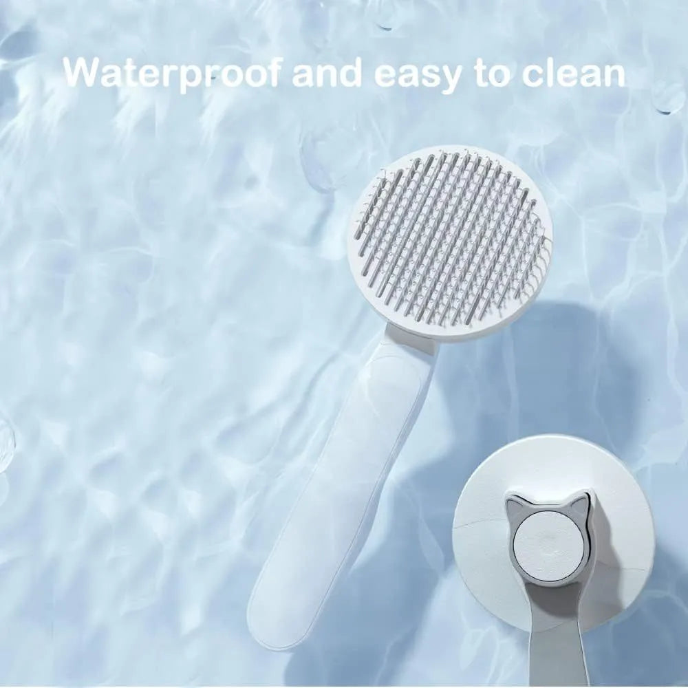 Self-cleaning cat brush with one-touch button for fur removal, available in blue grey pink colours