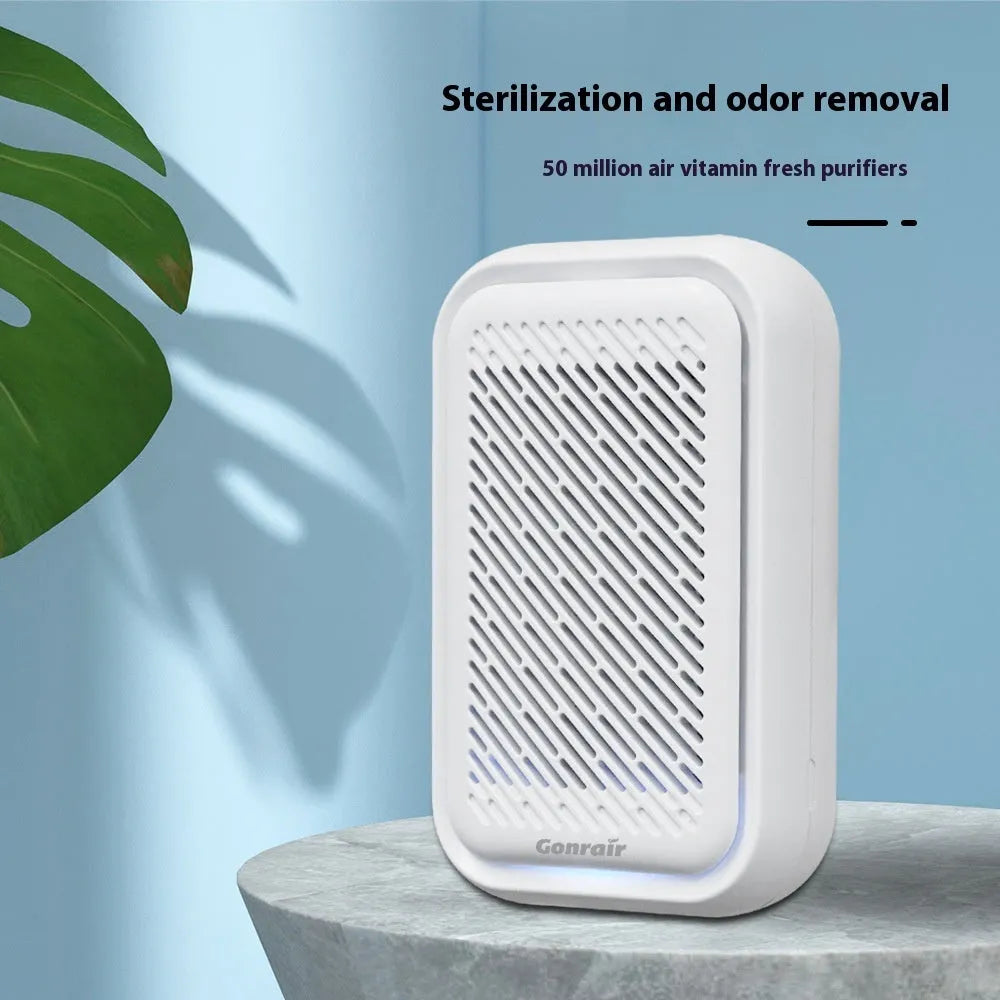 White wall-mounted air purifier with direct plug-in cord and filter screen