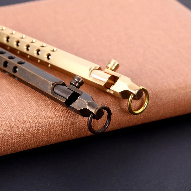 Brass hexagonal retro bolt pen with a 0.5mm tip shown next to a refill.