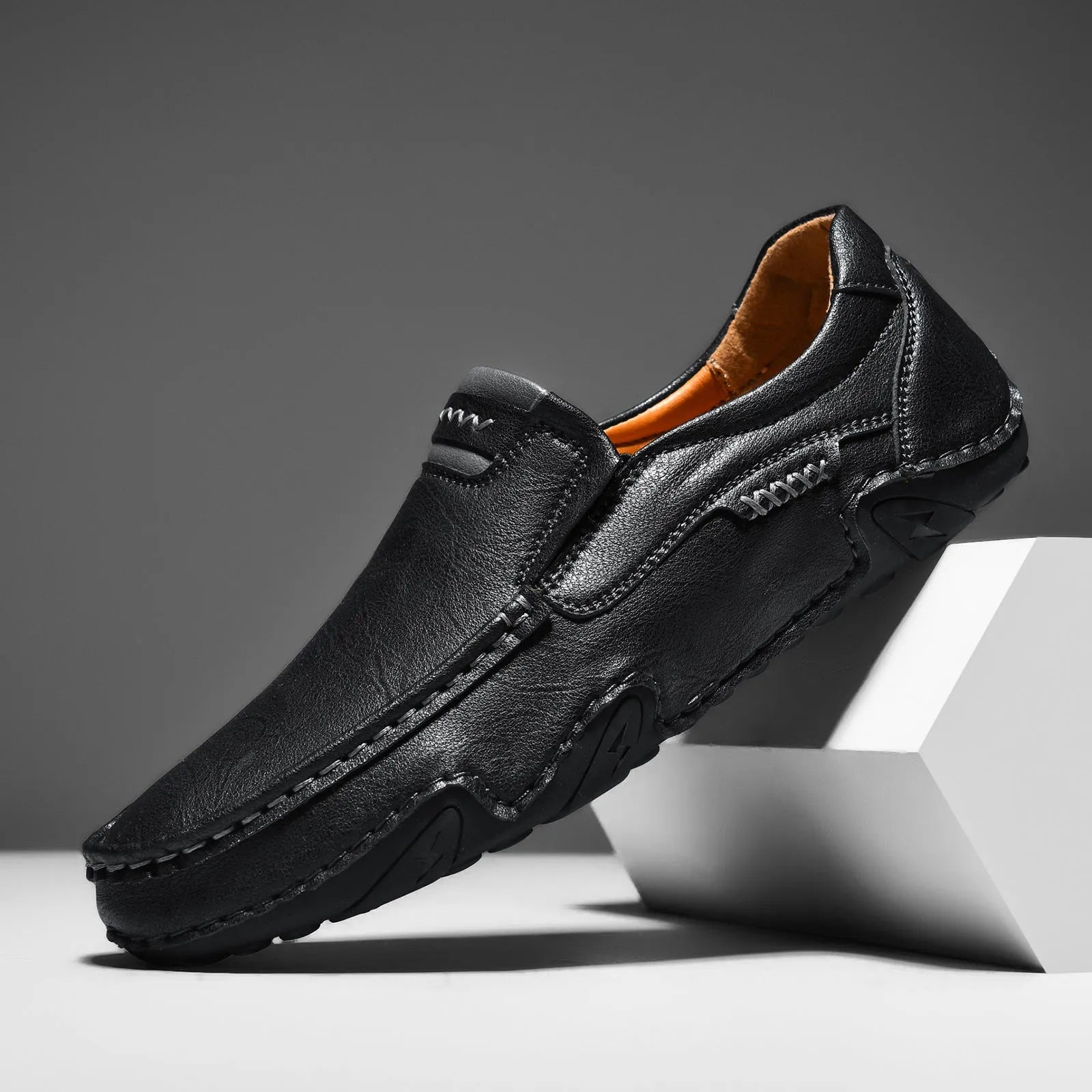 Leather lined slip-on casual shoes with flat rubber sole in multiple colour options