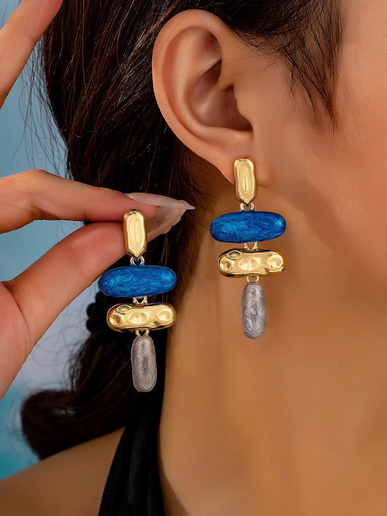 Geometry shaped stud earrings with multicolour electroplated finish on zinc alloy