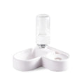 White food-grade plastic pet water fountain for cats and dogs on a countertop.