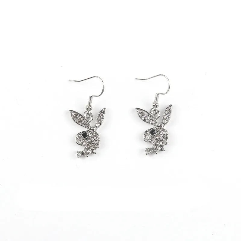 Close-up of cute full diamond rabbit stud earrings in alloy, showing gold, pink, and silver colour options.
