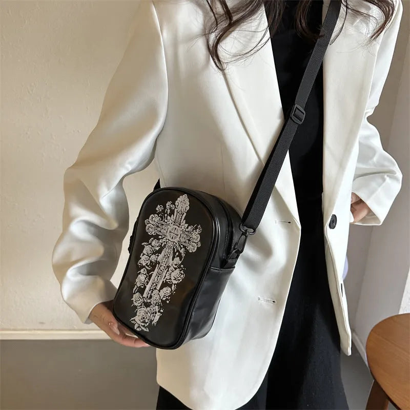 Halloween graffiti print crossbody bag with cartoon pumpkin ghost bat design in orange colour