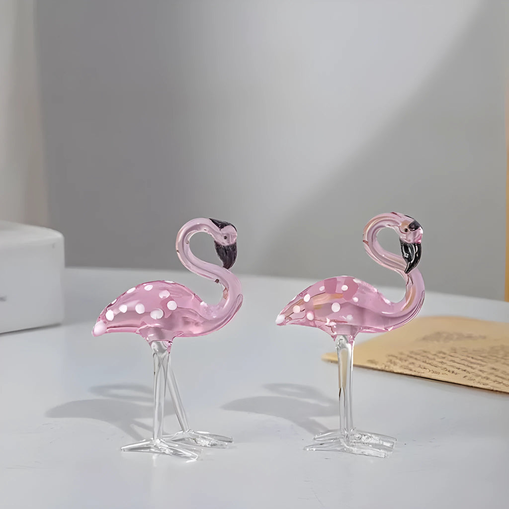 Pink crystal flamingo decorative sculpture on a table, modern simple style.
