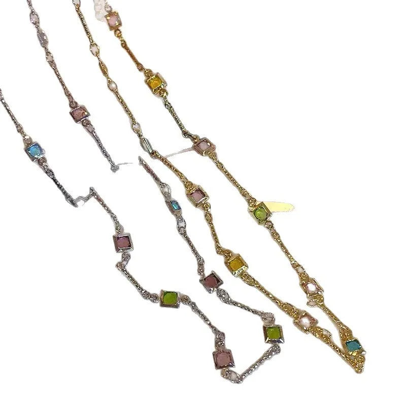 Square colour clavicle chain necklace with geometric crystal pendant in gold or white K finish.