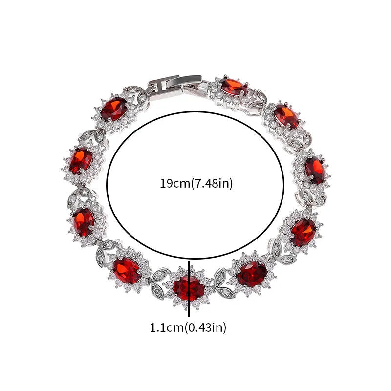 Women's bracelet with coloured zircon stone inlays in environmentally friendly alloy with electroplated finish