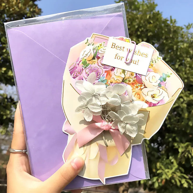 Handmade 3D boxed greeting card with butterfly shape, hot stamping, and artificial flowers on coated paper.