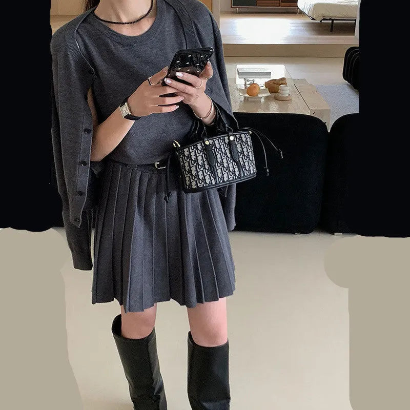 Women's black knitted vest skirt and cardigan two-piece set with 3D pattern and adjustable belt