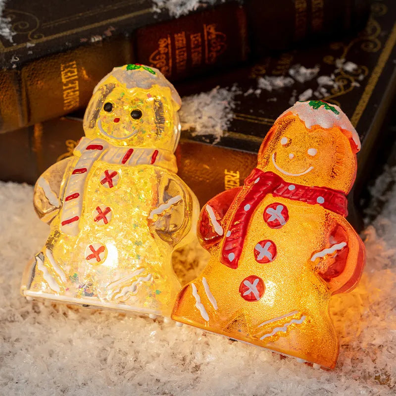 Glowing gingerbread man Christmas ornament with snowman design and LED lights