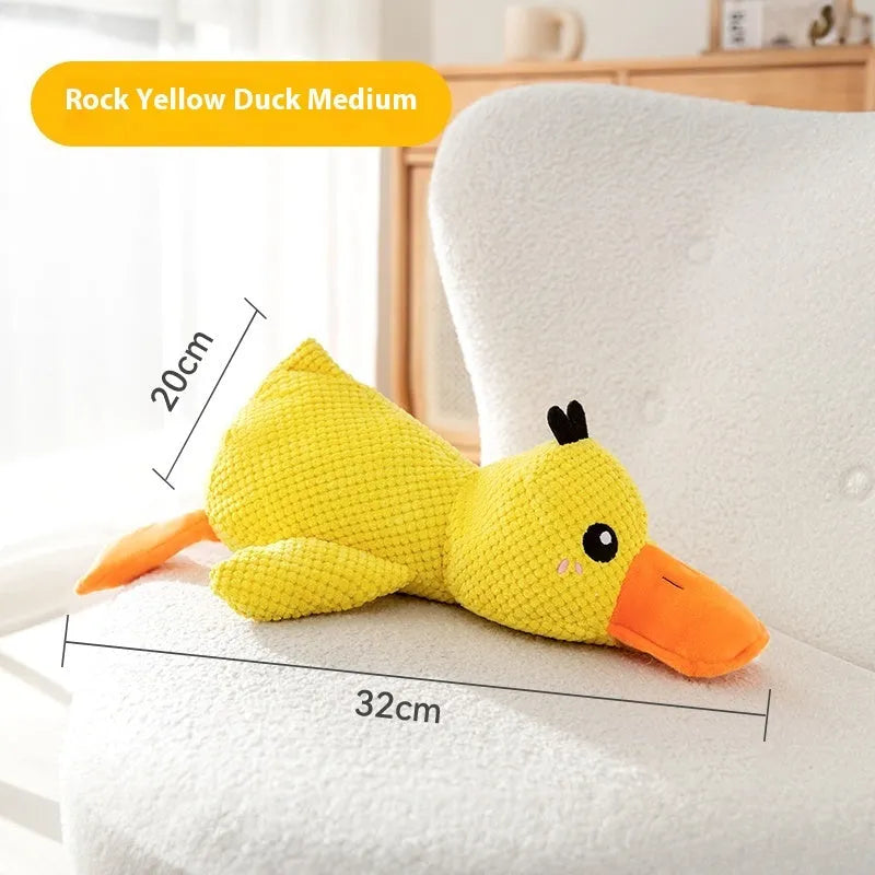 Bite-resistant dog toy with squeaker in rock yellow duck style on white background
