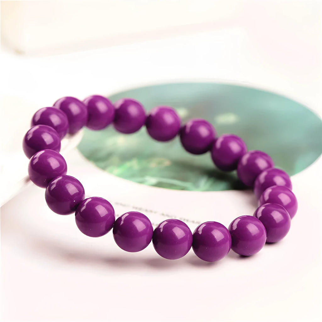 Jiuya purple mica crystal bracelet showing polished stones in 5A colour grade