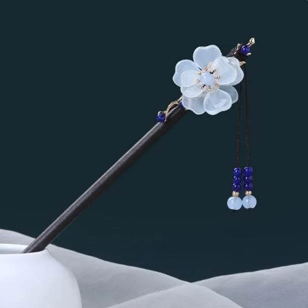 Chinese ancient style floral alloy hairpin with electroplated finish on dark background
