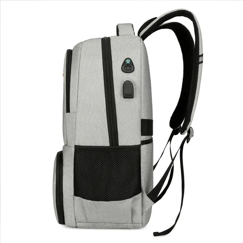 Light grey insulated Oxford cloth backpack with curved shoulder straps, showing dry wet separation compartments.