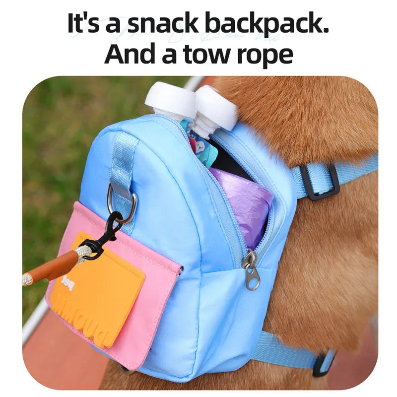 Blue multifunction dog backpack with adjustable harness, storage compartment, and attached tow rope on medium-sized dog